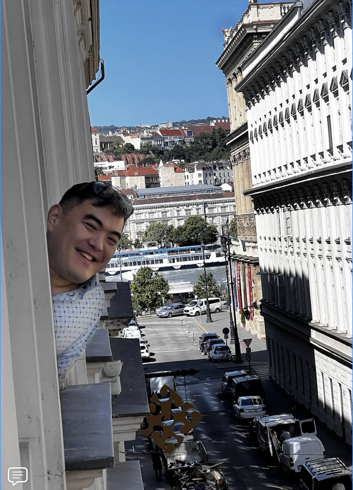 Man leaning out of window